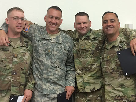Four people wearing camouflage - Lieutenant Colonel Brian V. Crupi's military service